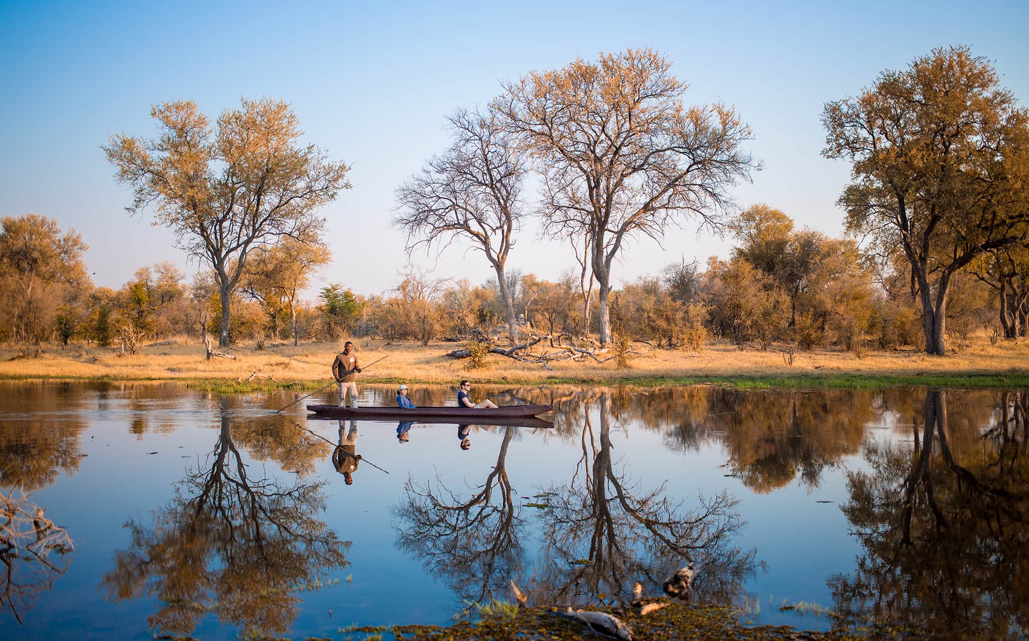 allison-mokoro-ride-water-reflection-machaba-camp-botswana-khwai-L1B2224 Romantic mokoro safari in Botswana