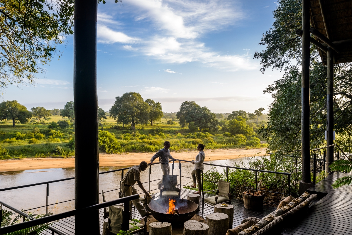 singita-ebony-lodge-sabi-sand-summer-safari Singita Ebony Lodge deck with firepit and stunning views of the river