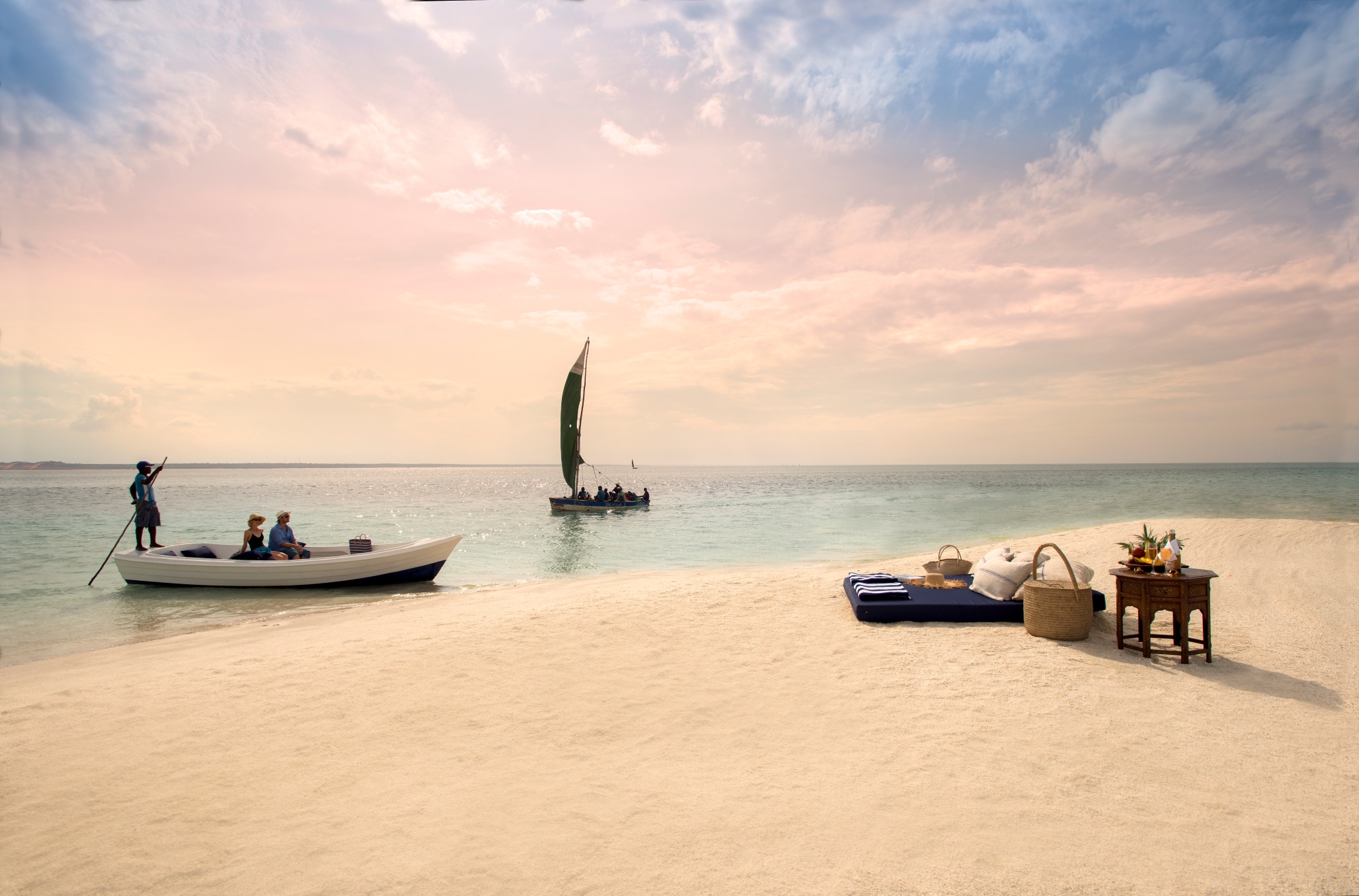 &Beyond-Benguerra-Island-cast-away-picnic-2 Guests arriving by boat for an awaiting private beach picnic