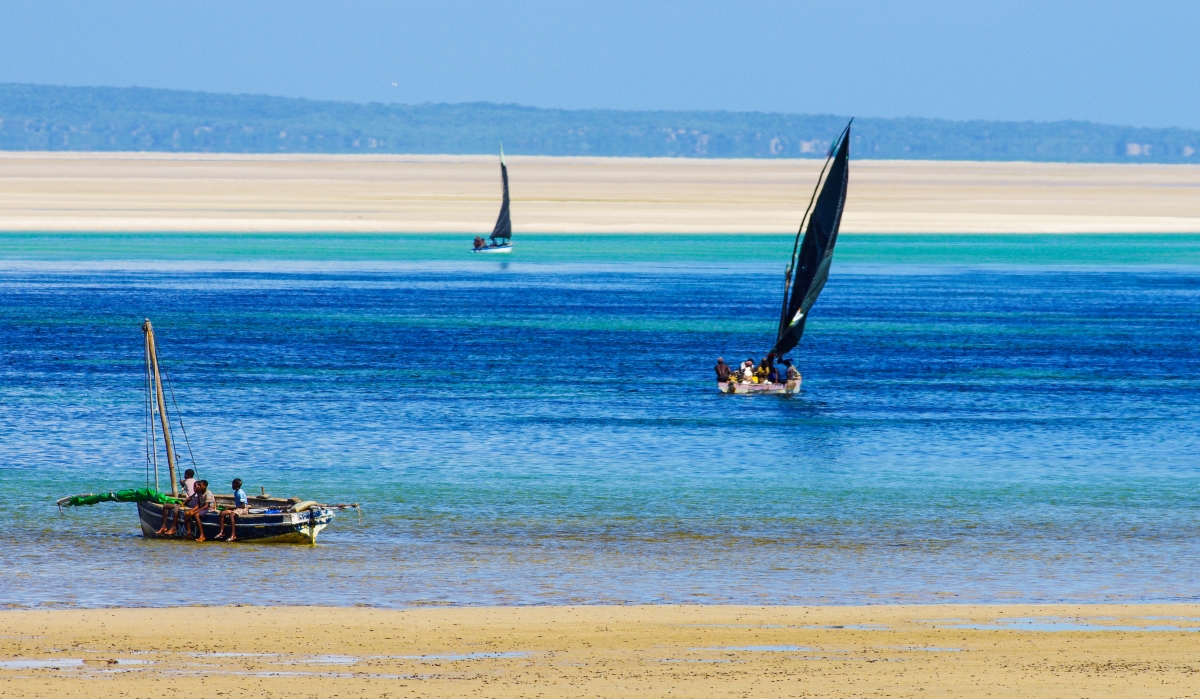 Fisherman-with-low-tide-in-Mozambique-152318847 Low tide makes for interesting scenery