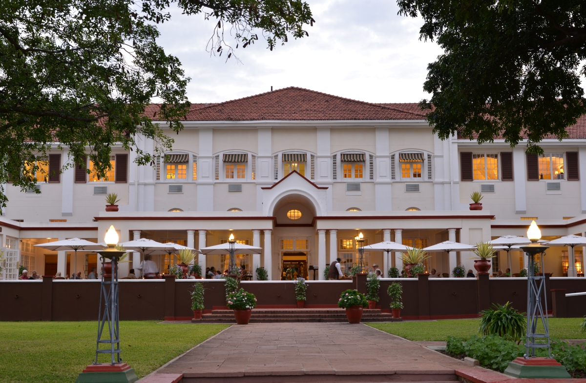 Frontal view of the grand Victoria Falls Hotel